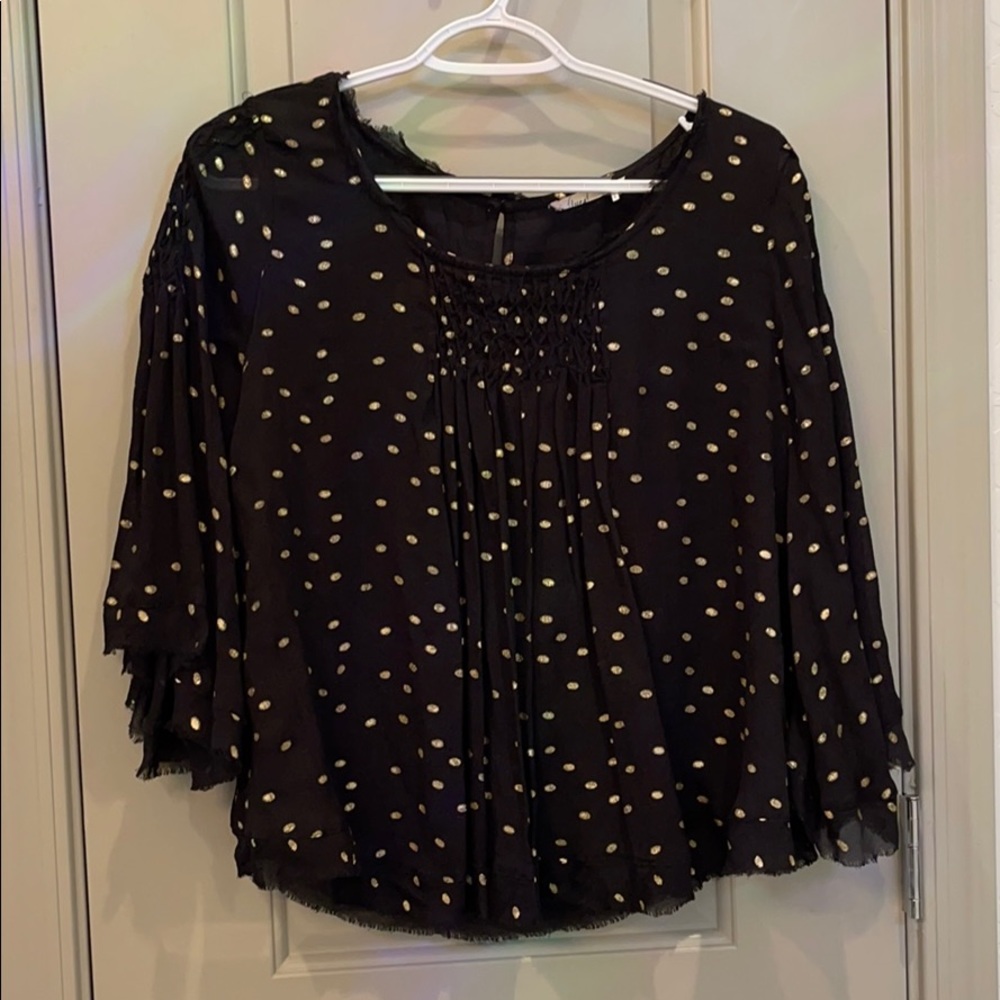 Black blouse with gold polka dots